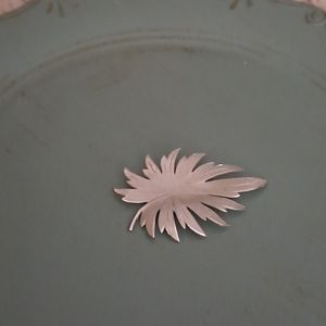 Brushed silver vintage brooch